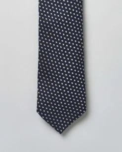 Cravatta Boss blu in misto seta e lana con micro fantasia panna