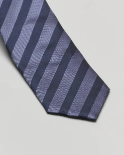 Cravatta regimental indaco con righe blu in pura seta