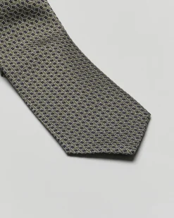 Cravatta verde militare in fantasia geometrica di misto seta e cotone