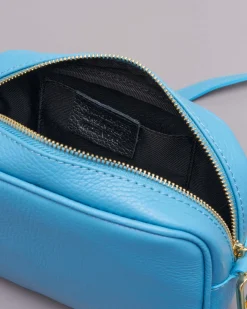 Cross bag azzurra in pelle effetto martellato