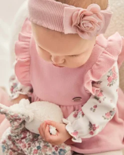 Fascetta in misto viscosa stretch rosa con fiorellino