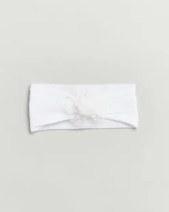 Fascia bianca da neonato con fiore in pizzo