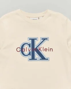 Felpa Calvin Klein beige a maniche lunghe con logo monogram azzurro