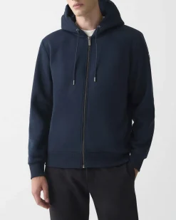 Felpa Colmar Originals blu con cappuccio chiusura zip e logo bollo applicato sulla manica