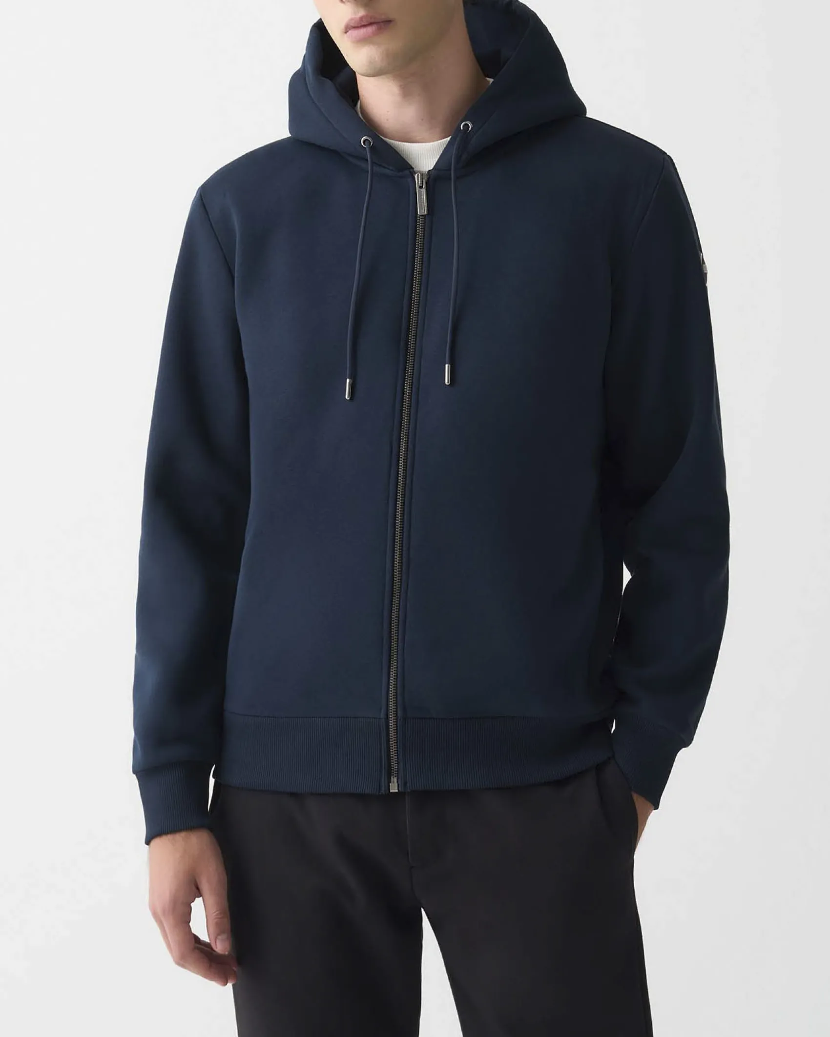 Felpa Colmar Originals blu con cappuccio chiusura zip e logo bollo applicato sulla manica