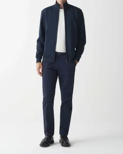 Felpa Colmar Originals blu con chiusura zip e logo bollo applicato sulla manica