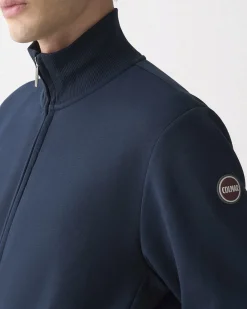 Felpa Colmar Originals blu con chiusura zip e logo bollo applicato sulla manica