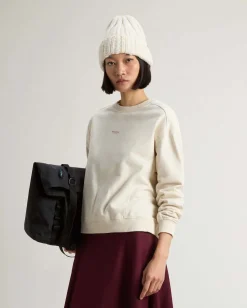 Felpa color latte Woolrich in cotone con scollo a giro e scritta logo stampata sul petto