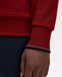 Felpa girocollo Fred Perry rossa con bordino blu e grigio sulla manica