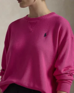 Felpa girocollo fucsia in cotone leggero con logo blu ricamato sul petto