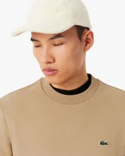 Felpa girocollo Lacoste color cammello con logo coccodrillo ricamato sul petto