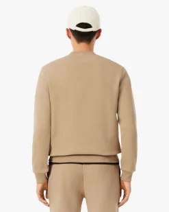 Felpa girocollo Lacoste color cammello con logo coccodrillo ricamato sul petto