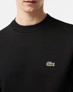 Felpa girocollo Lacoste nera con logo ricamato sul petto
