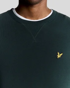 Felpa girocollo Lyle & Scott verde scuro con logo aquila gialla ricamato sul petto