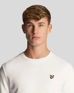 Felpa girocollo Lyle & Scott bianca in cotone con logo aquila gialla ricamato sul petto