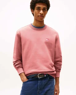 Felpa girocollo Tommy Jeans rosa con flag porta logo al petto