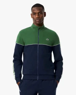 Felpa Lacoste color block verde e blu con piping porta logo e chiusura zip