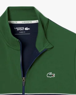 Felpa Lacoste color block verde e blu con piping porta logo e chiusura zip