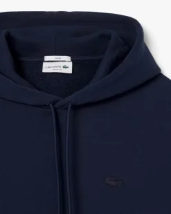 Felpa Lacoste loose-fit blu con cappuccio e tasche a marsupio