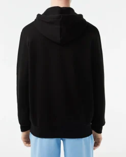 Felpa Lacoste nera con cappuccio e chiusura zip con logo ricamato sul petto