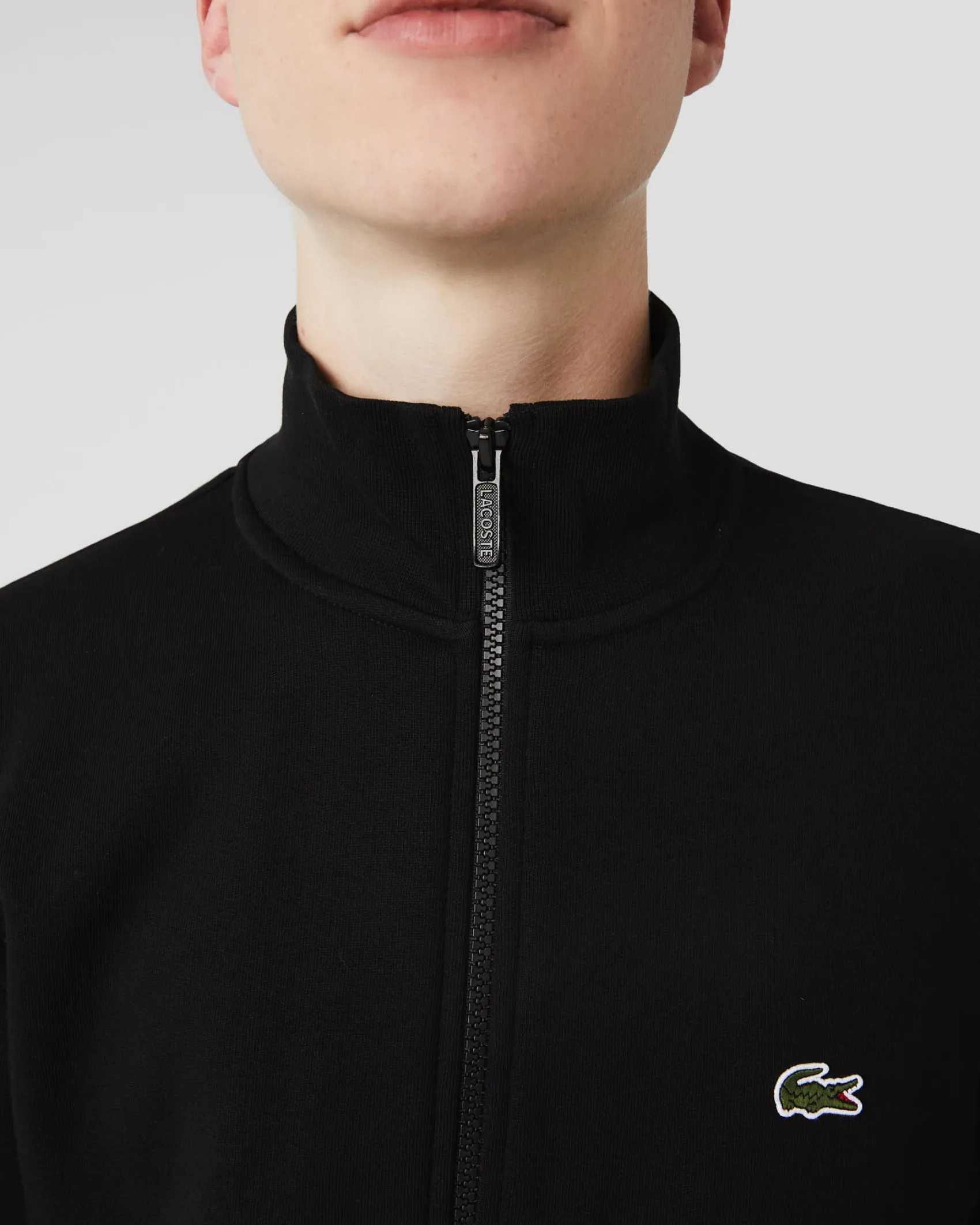 Felpa Lacoste nera con chiusura zip e logo ricamato sul petto