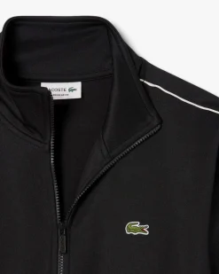 Felpa Lacoste nera in piquè interlock con piping bianco e chiusura zip