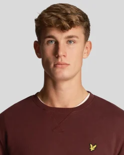 Felpa Lyle & Scott bordeaux girocollo con logo aquila gialla ricamato sul petto