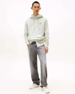 Felpa Tommy Jeans salvia con cappuccio e tasche a marsupio