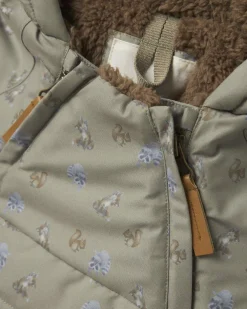 Giacca imbottita Lil'Atelier verde con interno in pelo marrone e fantasia animaletti