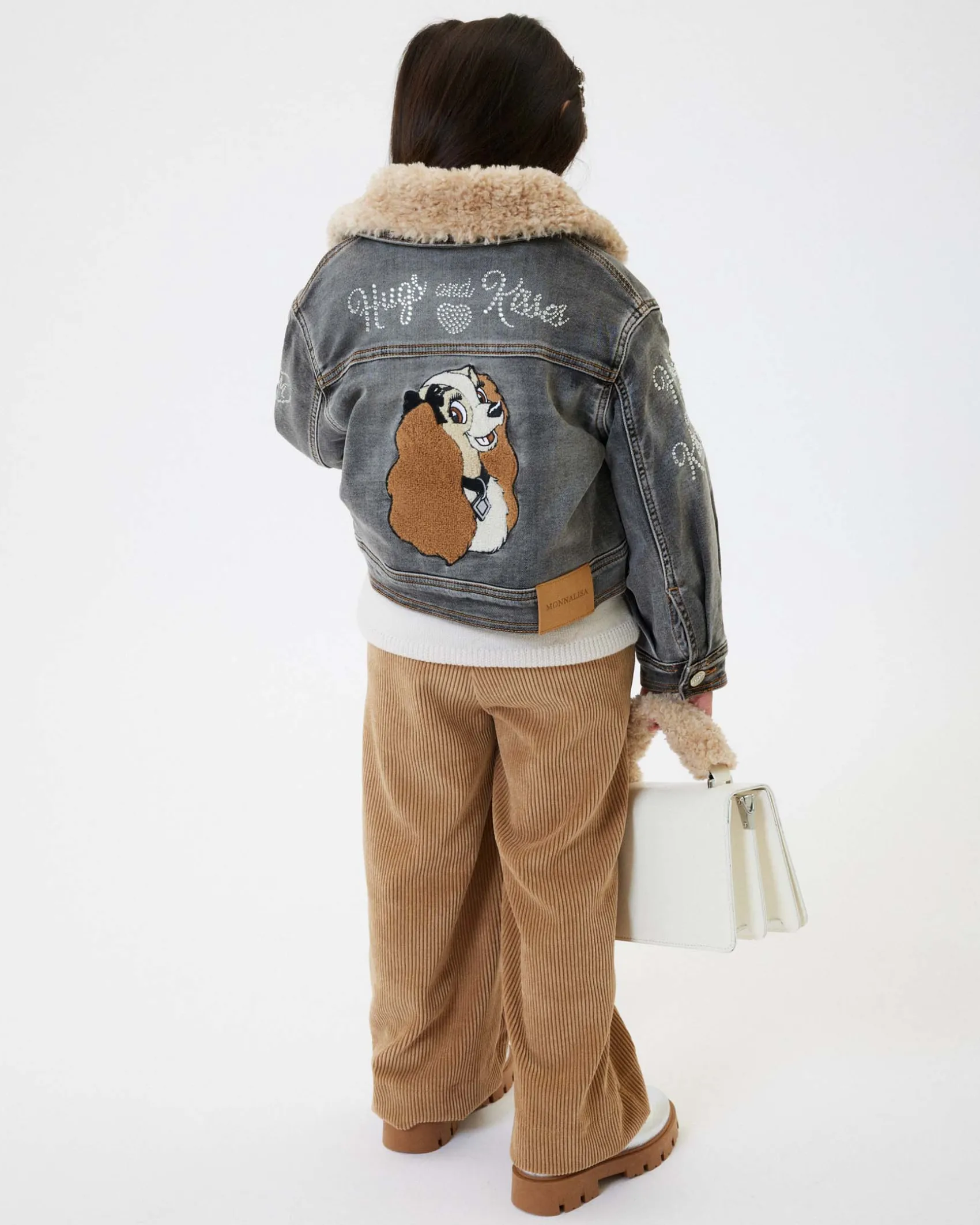 Giacca Monnalisa nera in denim di cotone stretch stone washed con colletto teddy beige
