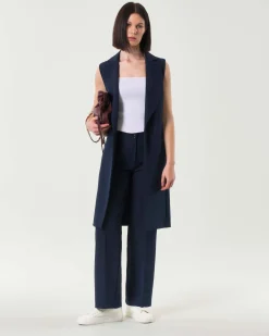 Gilet lungo blu in tessuto tecnico con scollo a rever senza bottoni di chiusura