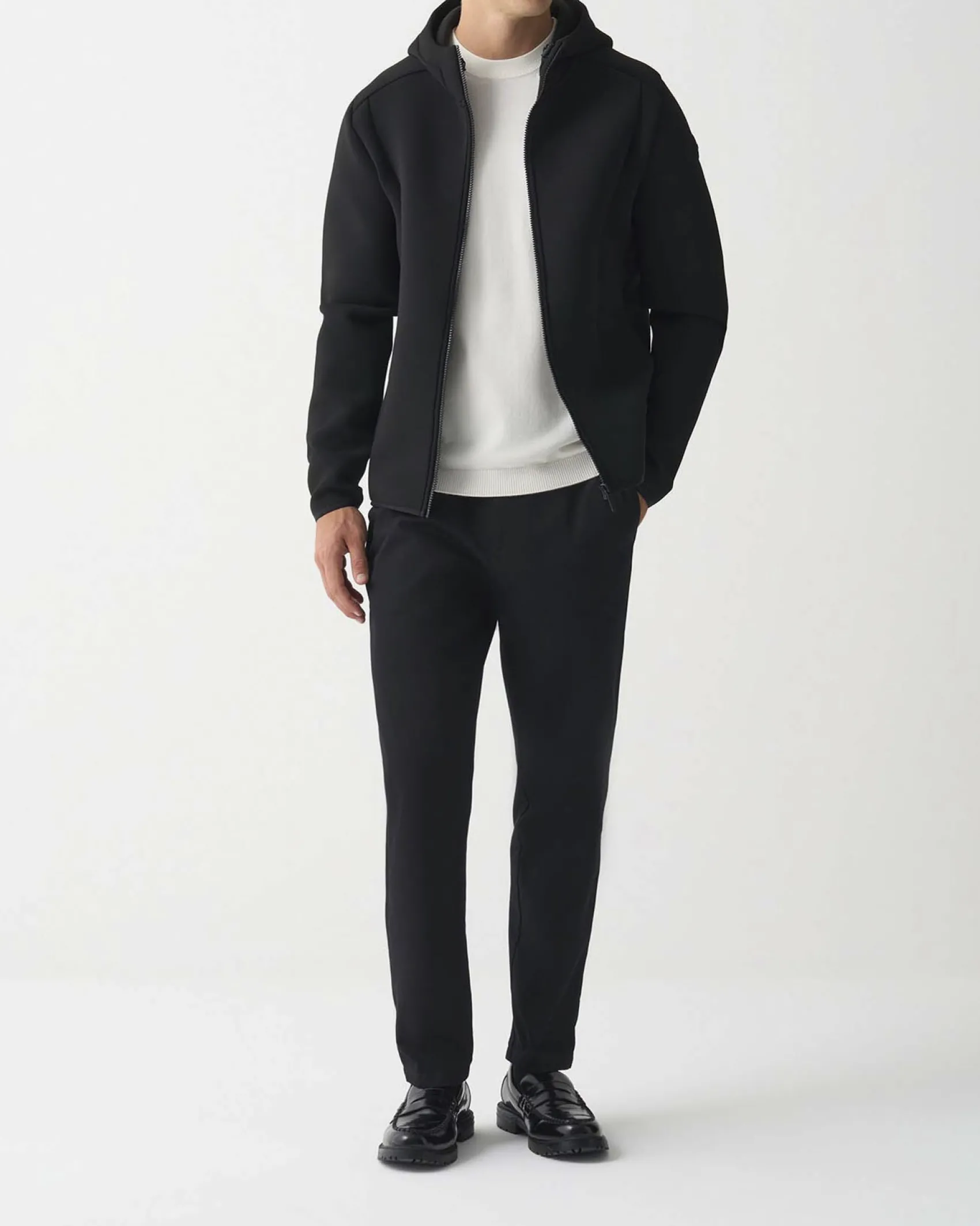 Giubbino Colmar Originals nero in tessuto stretch simil neoprene con cappuccio