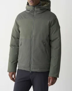 Giubbino Colmar Originals verde militare bi-tessuto con cappuccio e inserti su spalle e tasche in tecno maglia