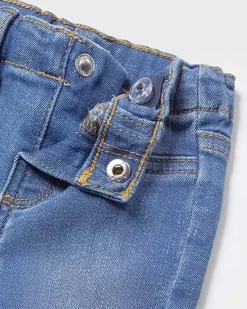Jeans a lavaggio medio con schiariture ed elastico inserito in vita 6-18 mesi
