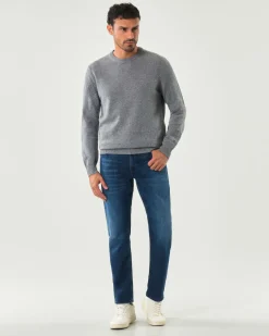 Jeans Boss Delaware slim-fit in cotone stretch lavaggio medio con leggere baffature