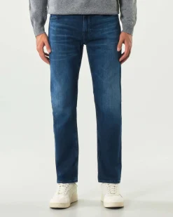 Jeans Boss Delaware slim-fit in cotone stretch lavaggio medio con leggere baffature