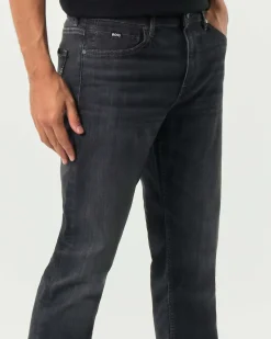 Jeans Boss Delaware slim-fit in cotone stretch lavaggio nero stone washed con leggere baffature