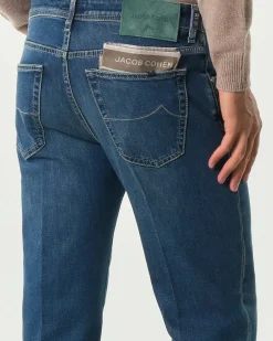 Jeans Jacob Cohen Scott carrot-fit in cotone stretch lavaggio medio stone washed con baffature