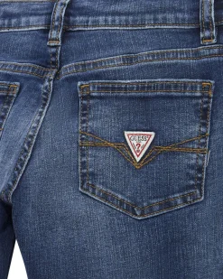 Jeans regular fit in cotone stretch a lavaggio scuro stone washed con abrasioni