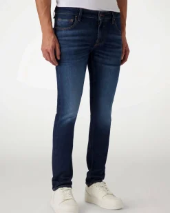 Jeans skinny Guess blu in cotone elasticizzato lavaggio scuro con baffature