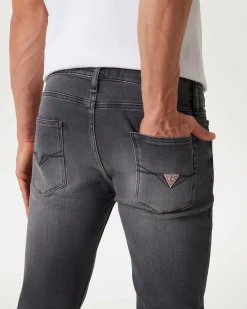Jeans skinny Guess grigio antracite in cotone elasticizzato con baffature