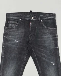 Jeans slim Dsquared2 lavaggio nero stone washed con baffature