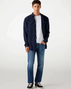 Jeans slim Guess blu in cotone elasticizzato lavaggio medio stone washed