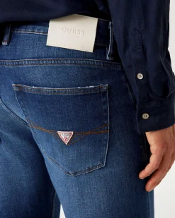 Jeans slim Guess blu in cotone elasticizzato lavaggio medio stone washed