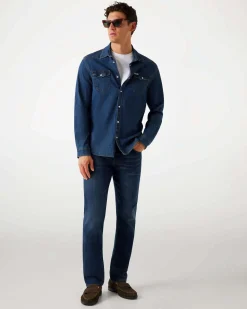Jeans slim Guess blu in cotone elasticizzato lavaggio scuro stone washed