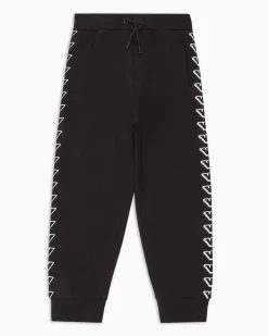 Jogger Emporio Armani in felpa di cotone nera con stampa grafica aquile bianche