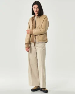 Maglia beige Hlo! in misto viscosa a trecce con spacchetti laterali al fondo