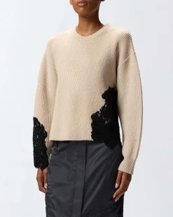 Maglia beige Pinko in lana a coste con scollo a giro e inserti in pizzo neri sul fianco e sulla manica