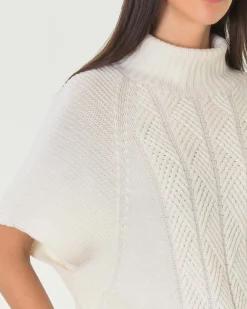 Maglia color panna in lana Tollegno con maniche corte a kimono e lavorazione a punti differenti
