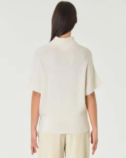 Maglia color panna in lana Tollegno con maniche corte a kimono e lavorazione a punti differenti